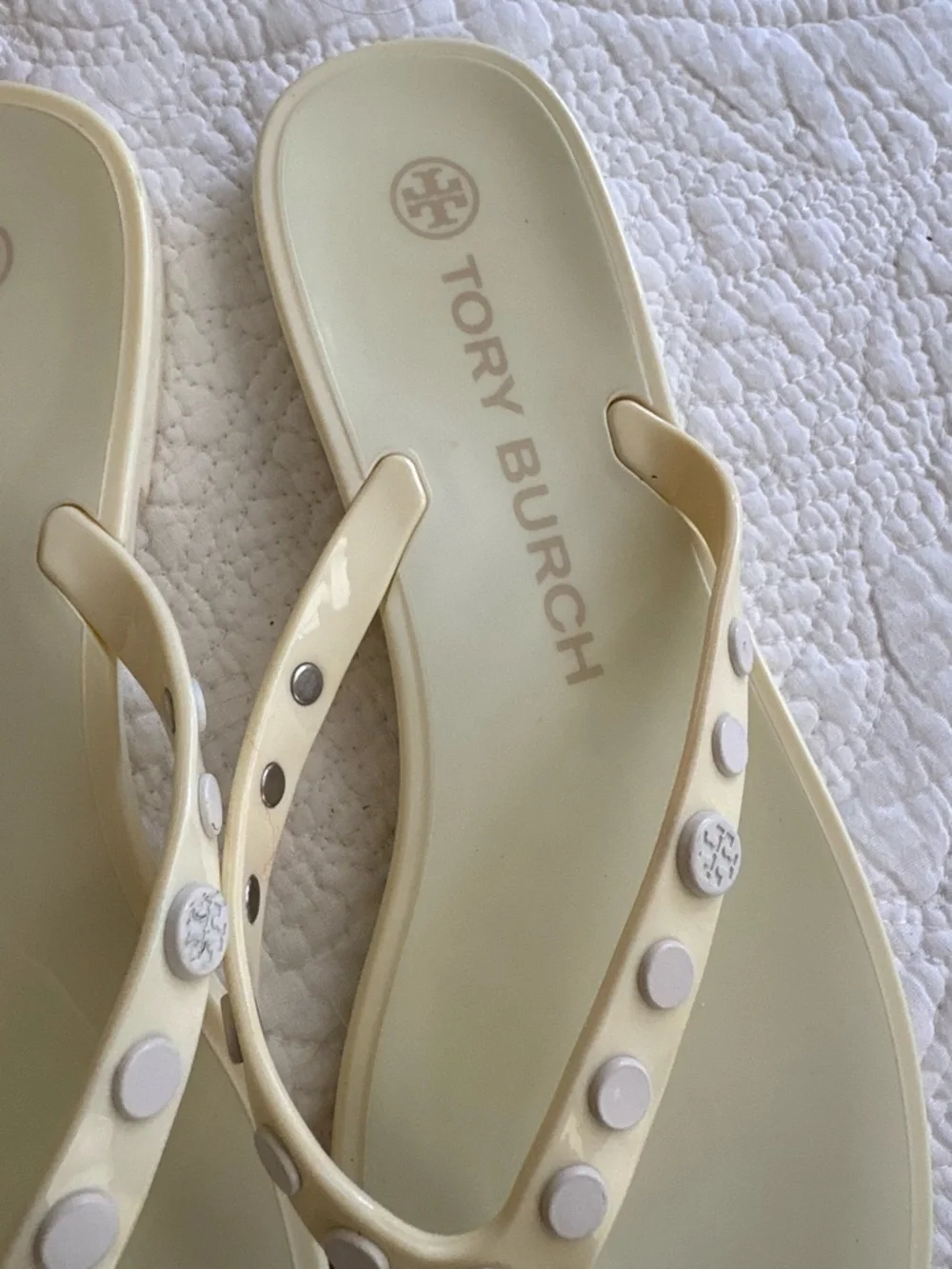 Tory Burch Ivory/pale yellow thong jelly  sandals size 7. Studded w/metal logos